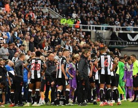 Newcastle against Tottenham is called off after a fan collapses, and Spurs players are praised for swiftly informing the referee.