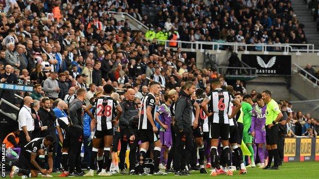 Newcastle against Tottenham is called off after a fan collapses, and Spurs players are praised for swiftly informing the referee.