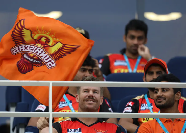 David Warner Waves SRH Flag cheering on his team during clash IPL 2021 in Dubai
