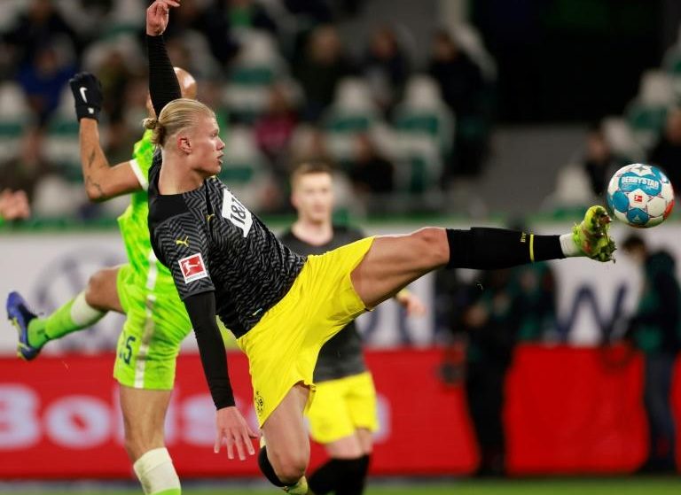 Karl-Heinz Riedle says Dortmund is “praying” Erling Haaland stays next season.