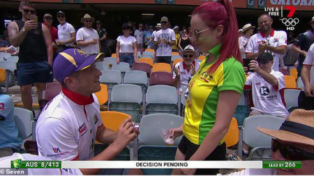 1st Ashes Test at the Gabba: an England fan proposes to an Australian fan.