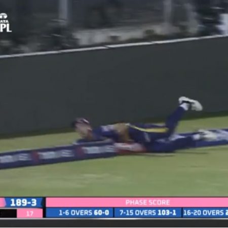 IPL 2022, Pat Cummins stumbles before completing a relay catch with Shivam Mavi.