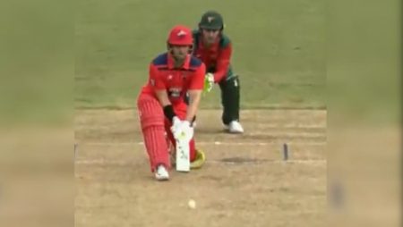 Australian batter hits the boundary with a unique back-of-the-bat shot