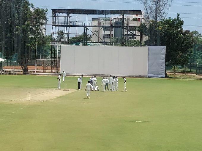 Venkatesh Iyer is hit on the neck by Chintan Gaja’s throw and limps off the field in pain.
